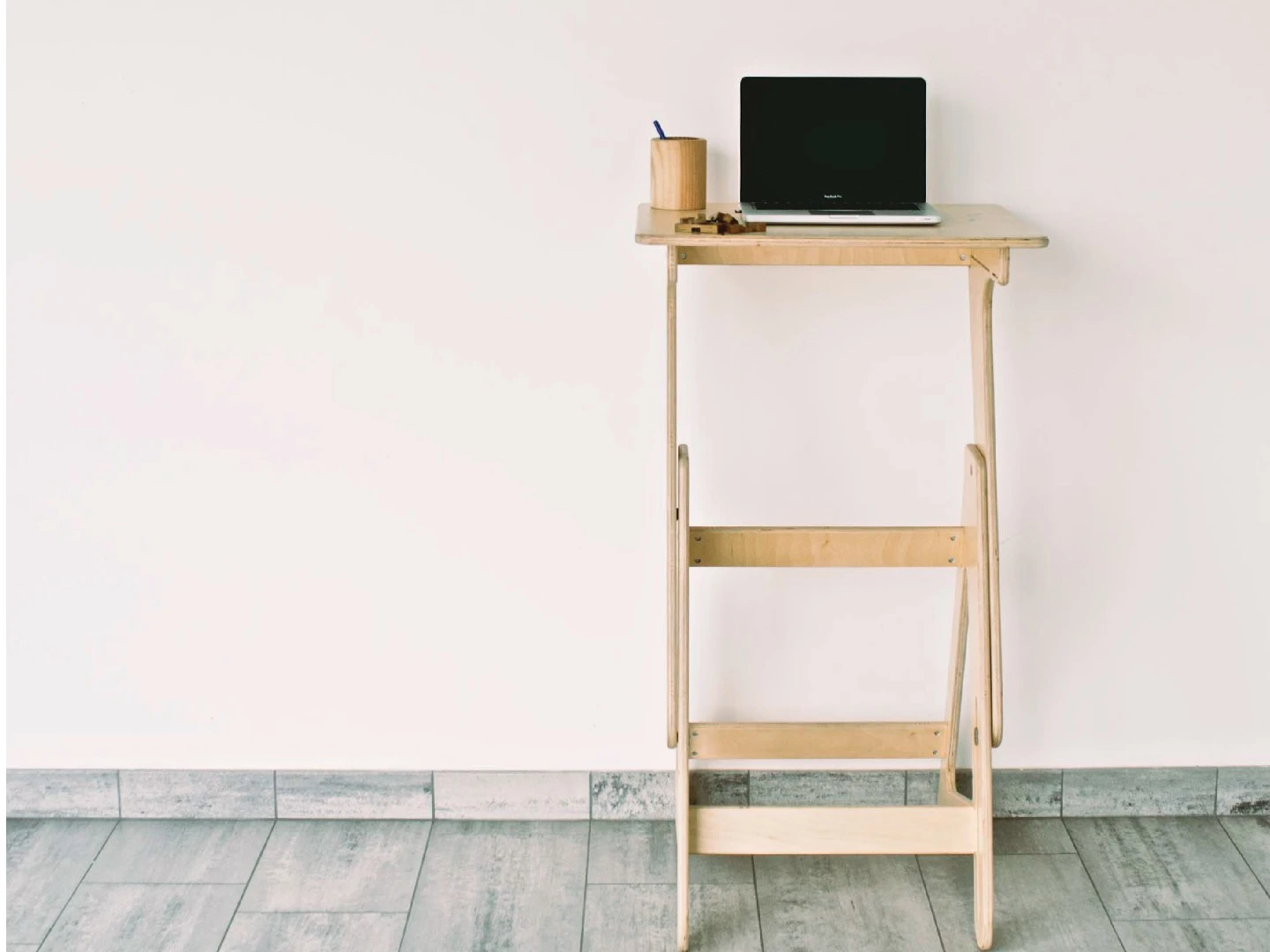 The desk sports an additional shelf for extra storage space