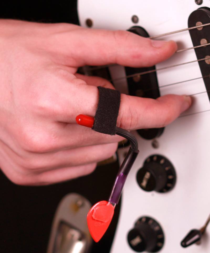 The Pick Slinger quickly gets the pick out the way during finger picking play