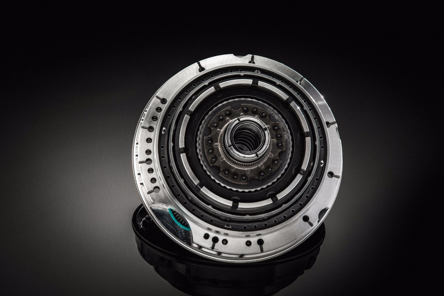 The front support assembly on the transmission has a clutch spinloss reduction feature