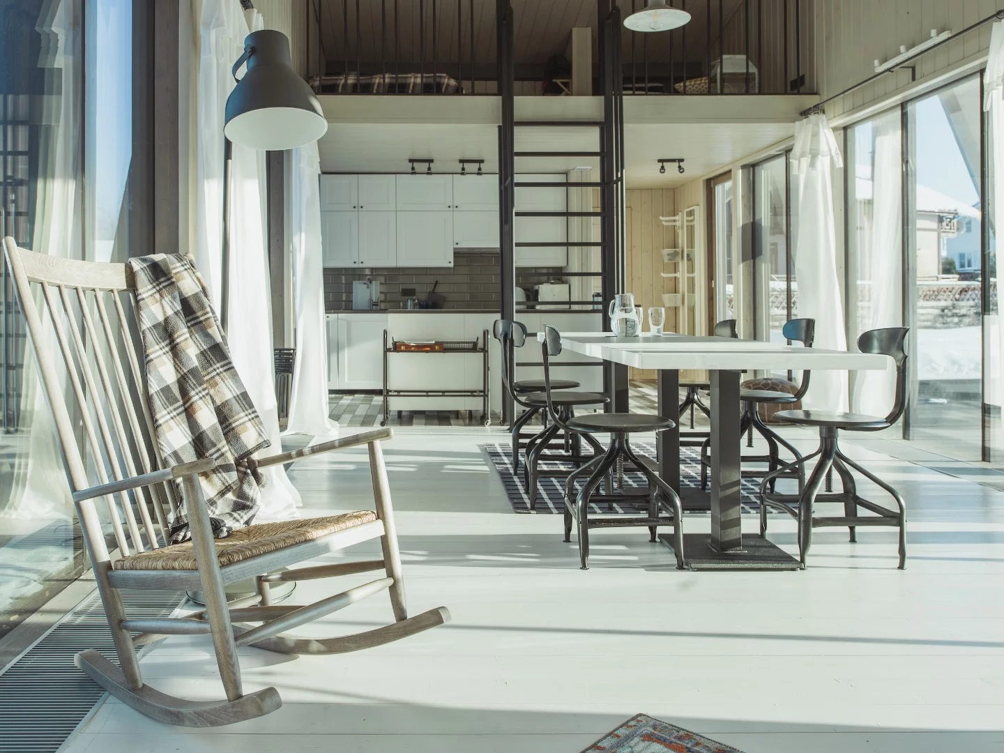 Bridge House features a small loft bedroom above the kitchen
