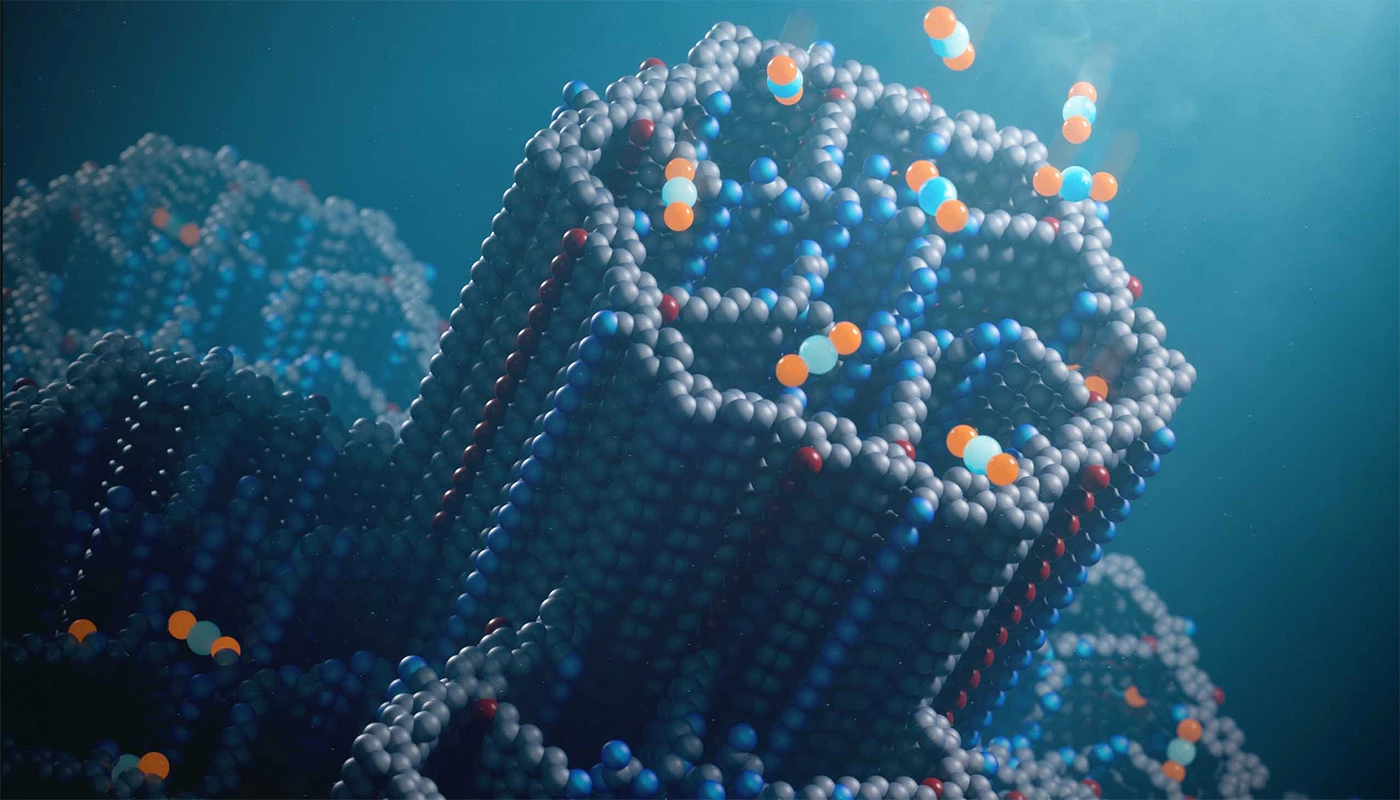 A visualization of COF-999, featuring hexagonal channels decorated with polyamines that bind CO2 molecules (blue and orange balls)