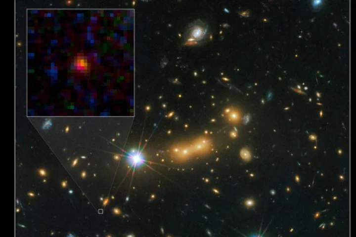 Distant galaxy lensed by Cluster MACS J0647 (Image: NASA)