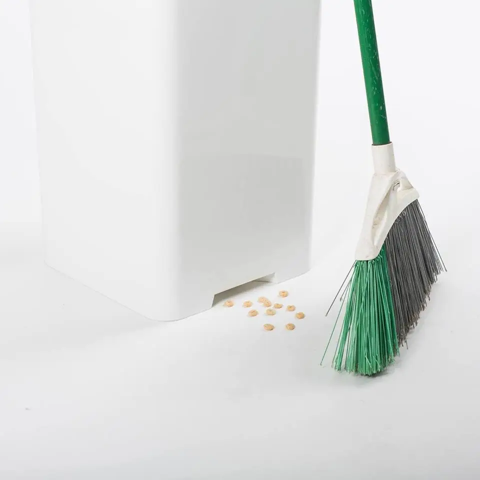 The Bruno garbage can automatically vacuums up whatever is swept into its suction port