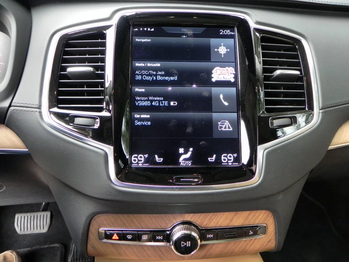 Dominating the dashboard space is the huge 9-inch touchscreen oriented like a vertical tablet