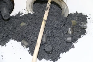 Solid black carbon powder, a byproduct of methane cracking