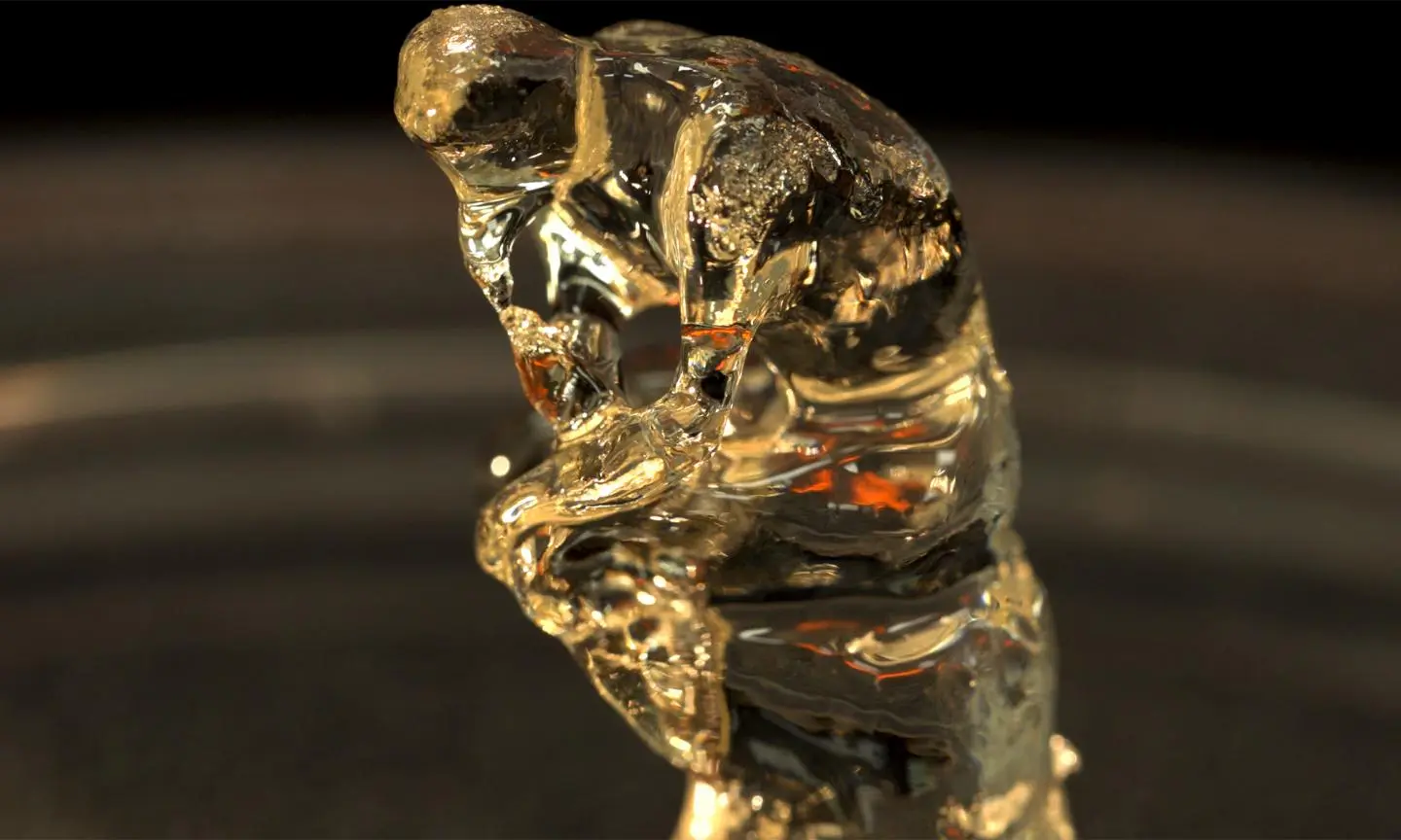 A miniature version of the statue "The Thinker," created using the new 3D-printing system