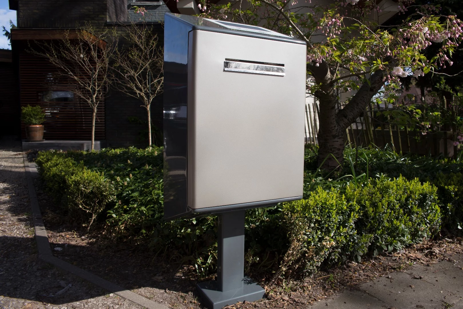 Package carriers, and even local shops and supermarkets, can gain access to a locked smart letterbox via a companion smartphone app