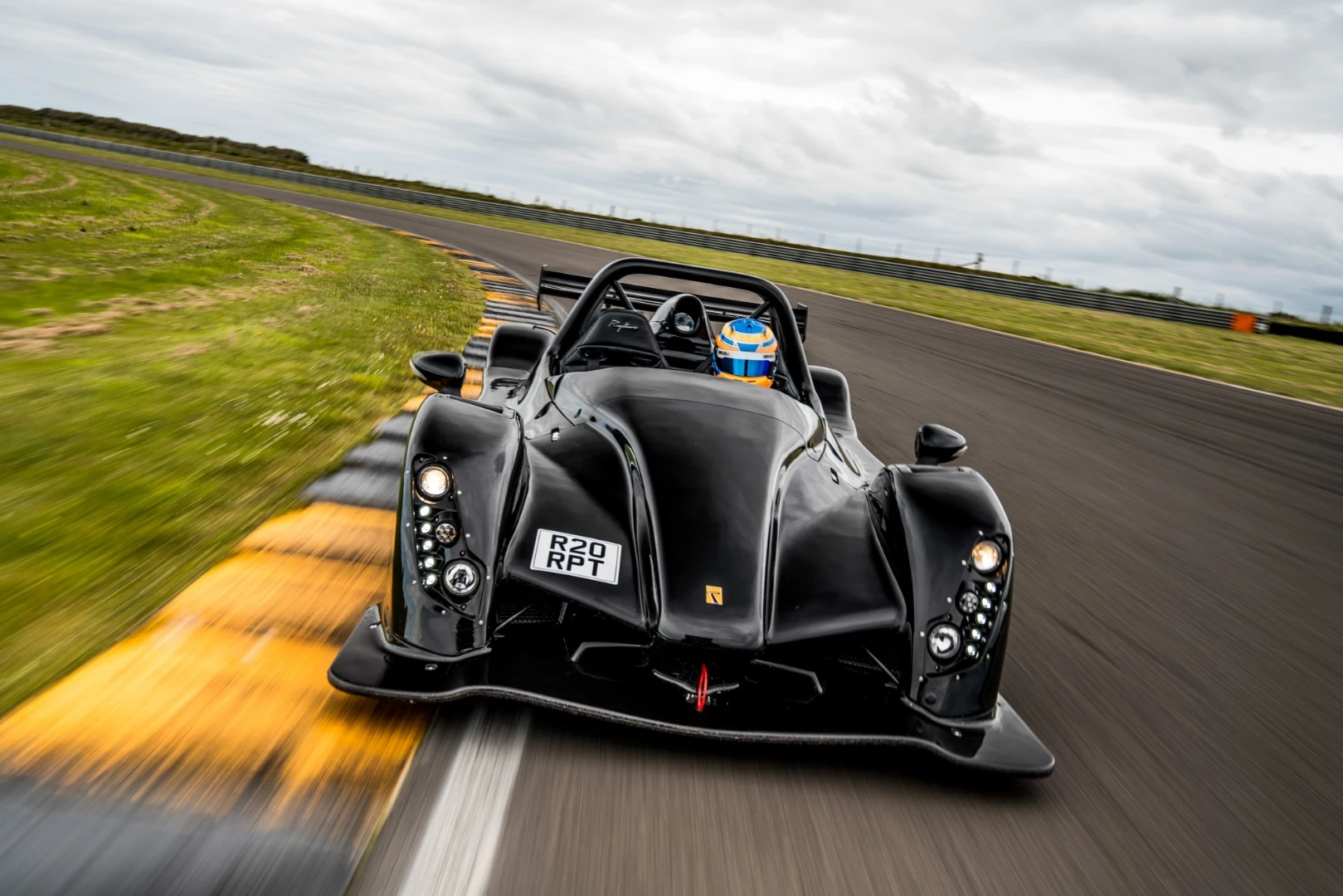Composite bodywork and space frame keep weight down to 765 kg