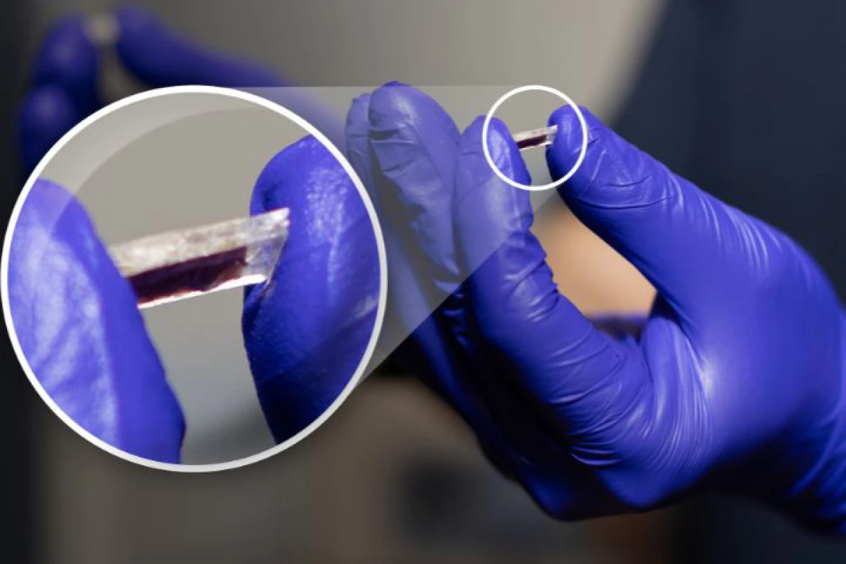 A University of Houston researcher holds a newly developed piezoelectric sensor that operates under extreme temperatures and harsh environmental conditions