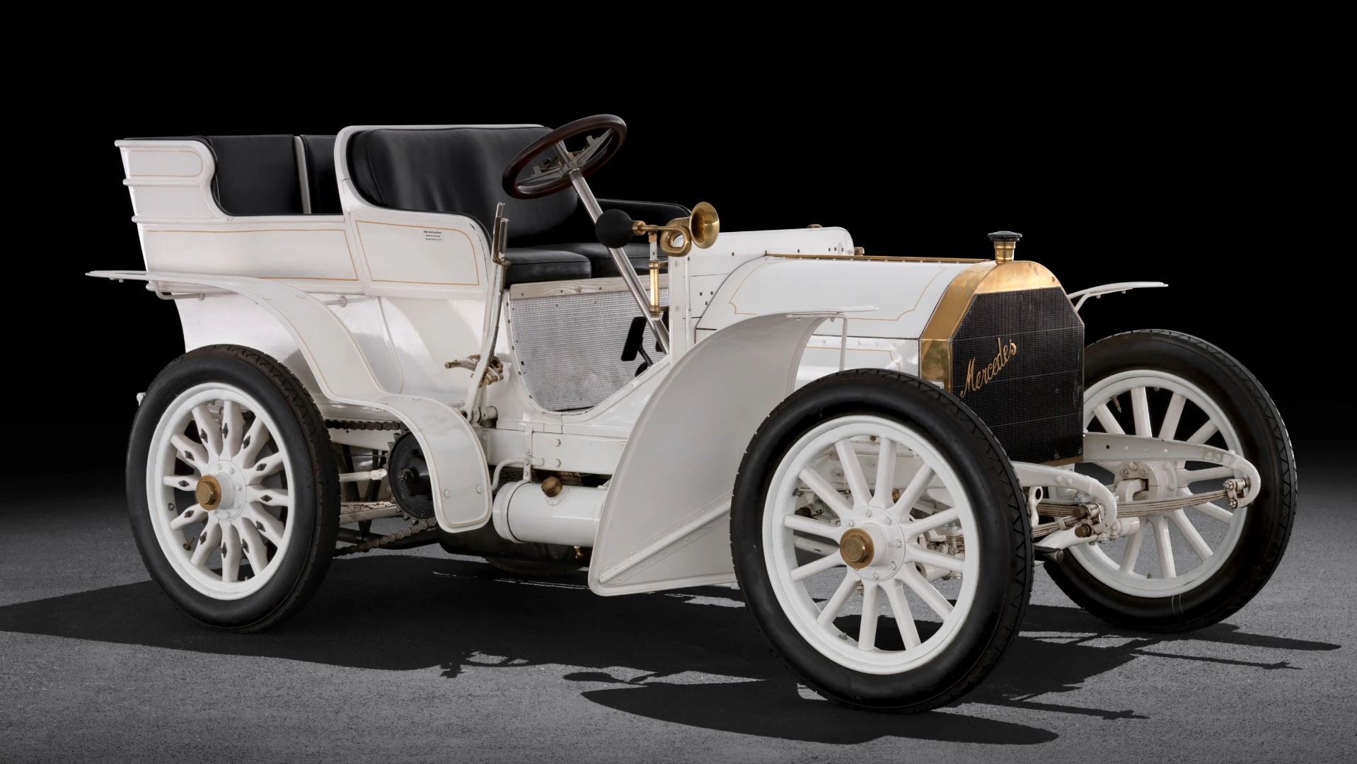 The Mercedes 35 hp of 1901 is often referred to by automotive scribes as the first modern motorcar. It's the first time the Mercedes name appears in automobile production, though the instigator of the car, Austrian diplomat and entrepreneur Emil Jellinek, did have a prestige auto dealership in Nice which used the Mercedes name prior to this car. In owning a prestige car dealership and running a racing team to promote his wares, Jellinek had a few ideas he wanted to try and he negotiated with DMG to produce him 34 cars to his basic design and specification. The car was designed by Wilhelm Maybach and Paul Daimler to Jellinek's requirements.