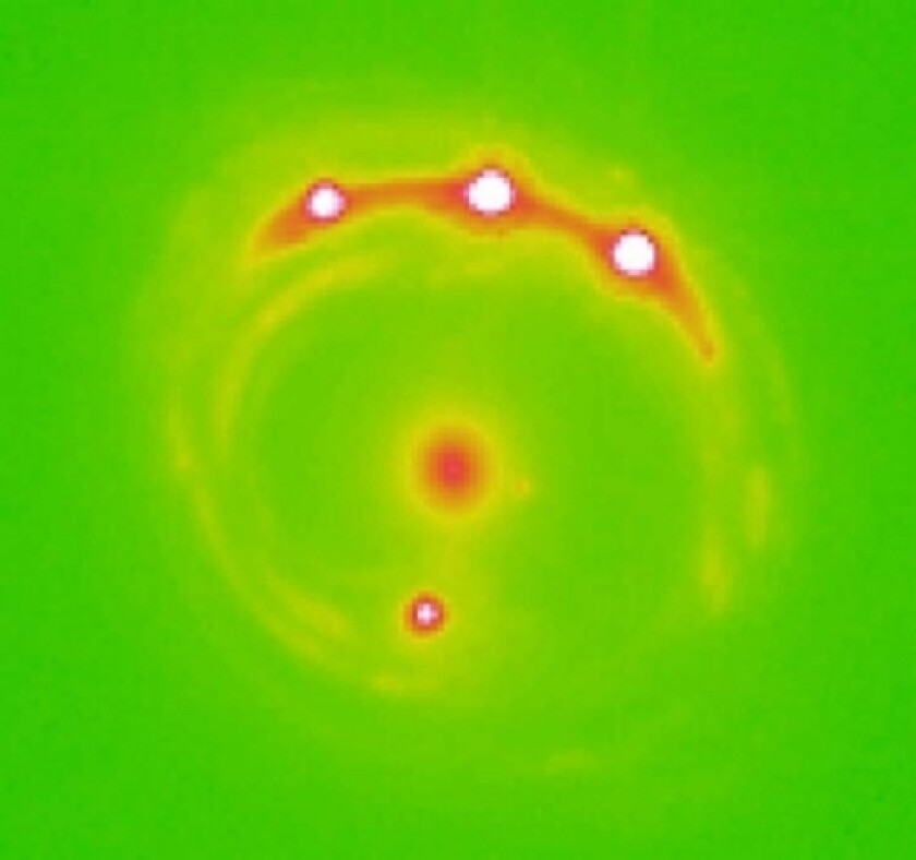 Gravitational microlensing has helped astronomers discover exoplanets beyond the Milky Way
