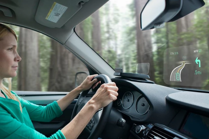 The Navdy prototype heads-up display (HUD) projects information onto the windscreen