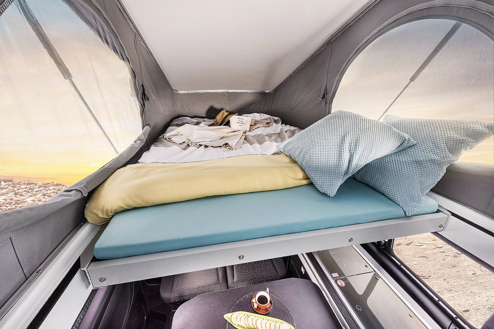 The VanTourer Urban sleeps four people on upper and lower beds