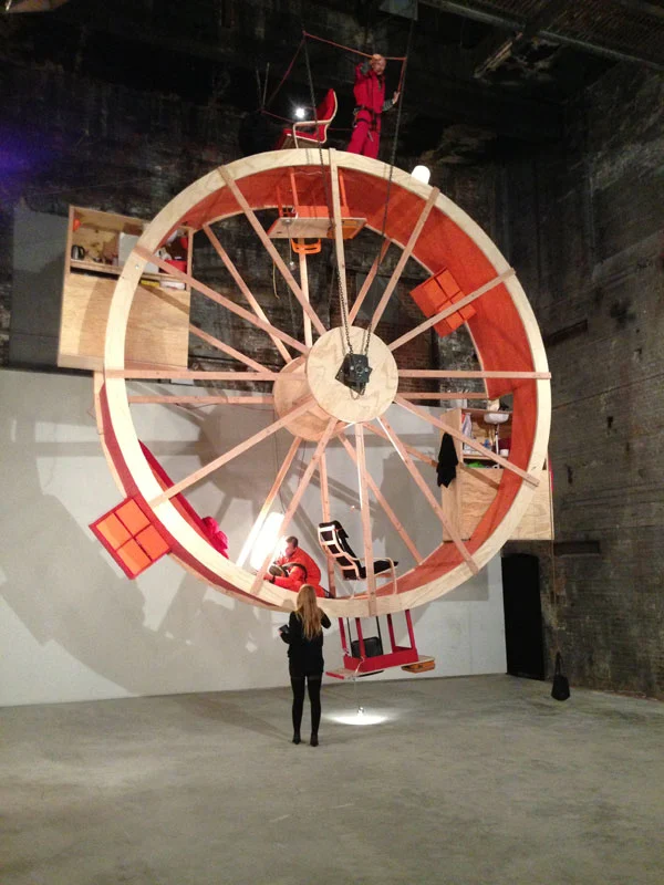 In Orbit features a large 7.6 m (25 ft) wheel constructed from wood and steel (Photo: Pierogi Gallery)