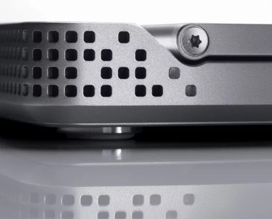 The Adamo's round square (?) airflow vents, inspired by fine Swiss watches apparently.