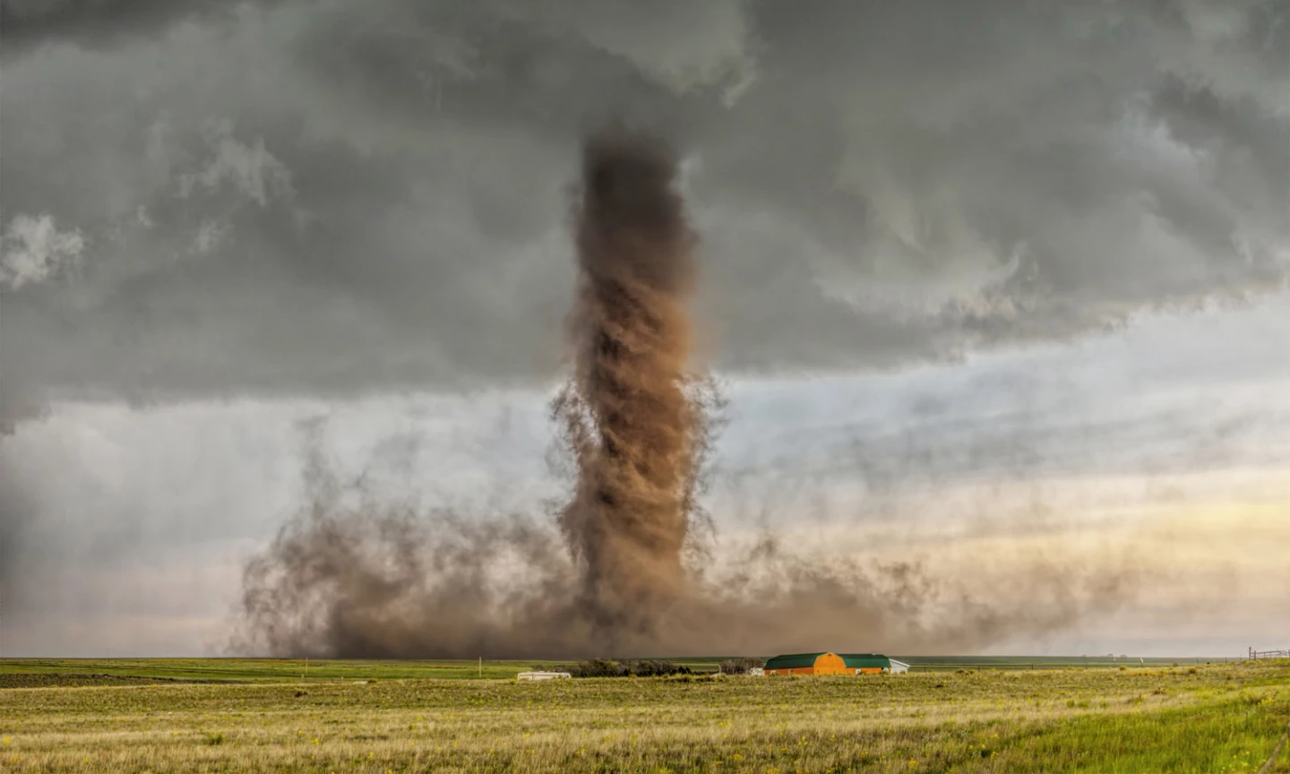 Australia's James Smart found himself in Colorado as this "drill bit" tornado touched down, ripping up soil to give it an earthy color