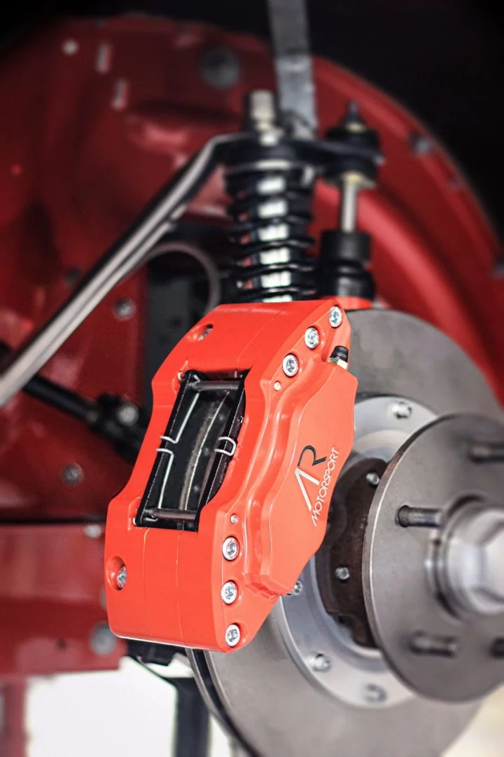 Uprated brakes fit in with the car's racy character