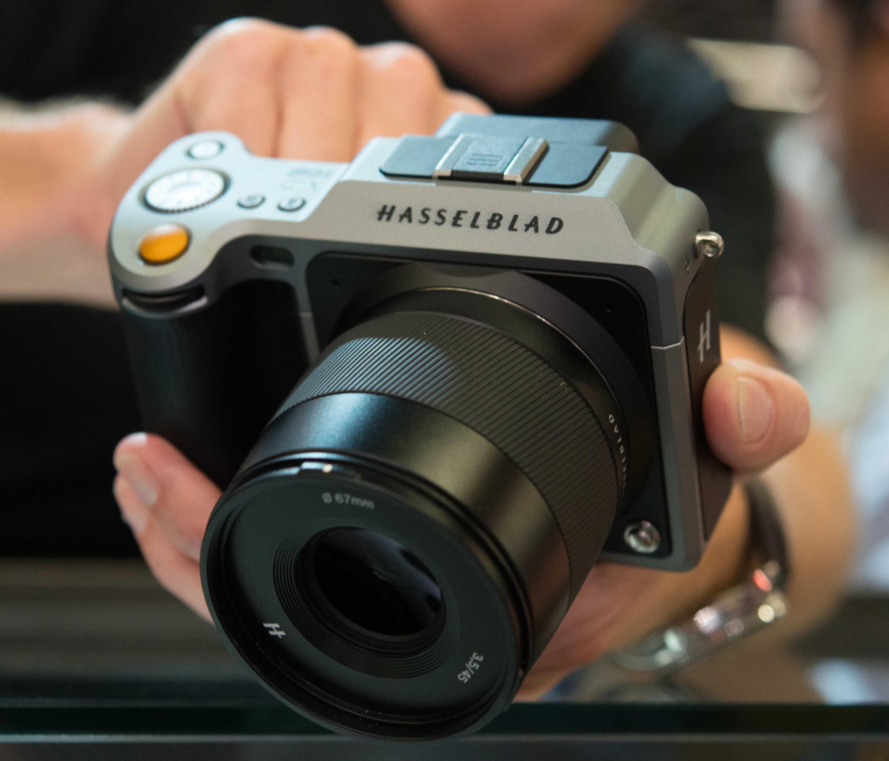 The Hasselblad X1D mirrorless medium format camera features a minimalist design