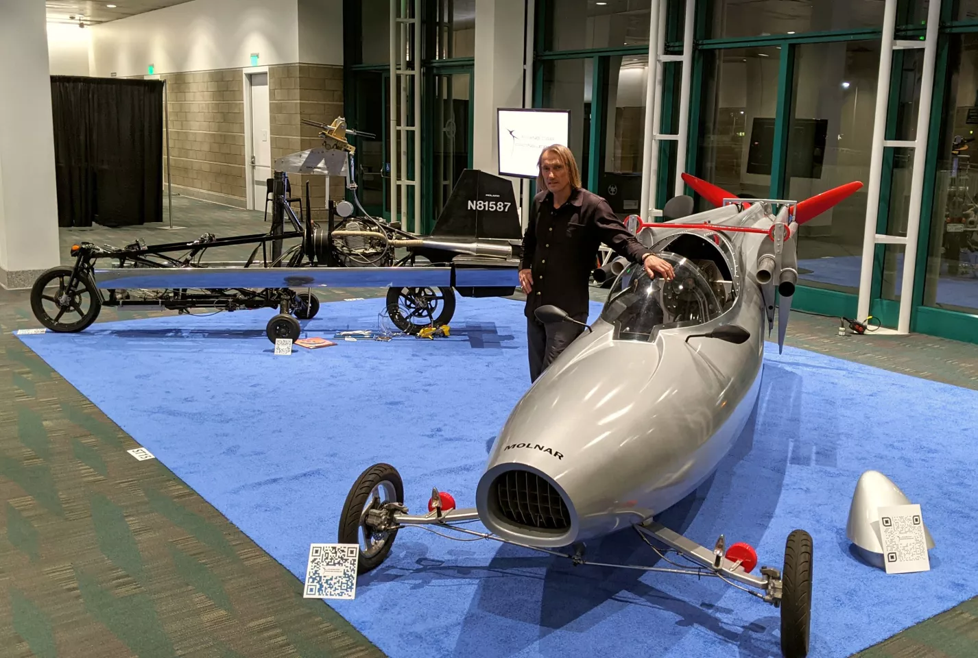 Dezső at the LA Auto show, showing off the Streetwing alongside other major-leaguers like Fisker (at the time) and Porsche