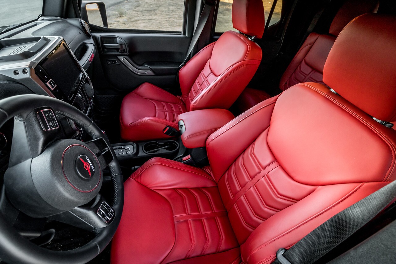 The Tank X wears red leather and includes a 7.9-in infotainment system