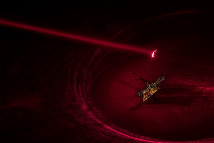 RoboFly is powered by a laser