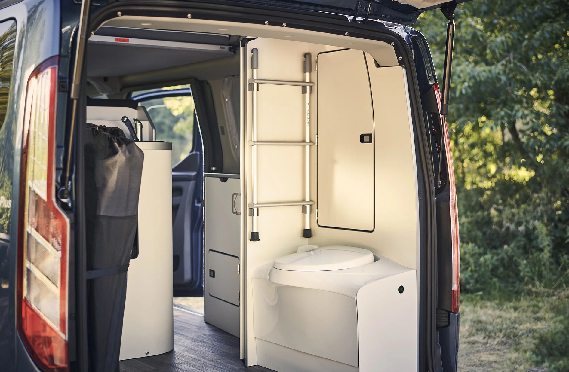It's not as elegant as the complete wet or dry bathrooms found in larger motorhomes, but the Nugget Plus bathroom is certainly more convenient than a portable toilet stored away under a bench or in a cabinet