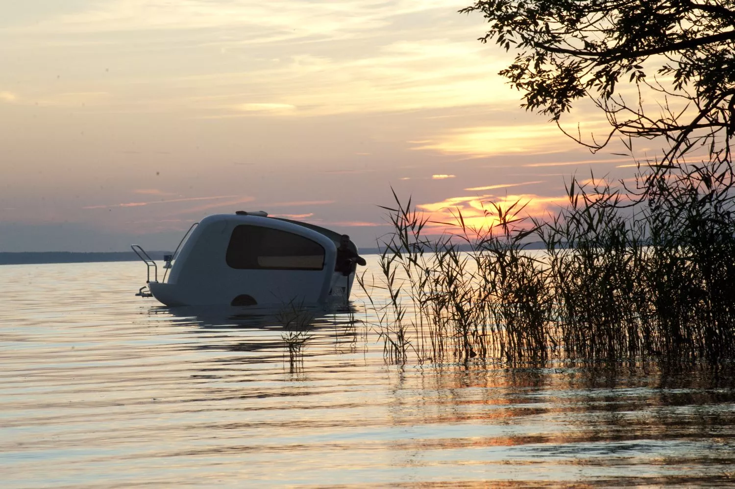 Sealander is a unique vehicle that combines features of an electric motor-powered boat and a camping trailer