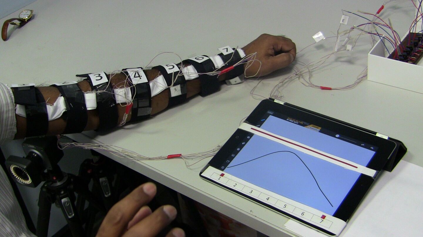 The guiding robot sends signals to the user via a haptic-feedback sleeve (Photo: EPSRC)