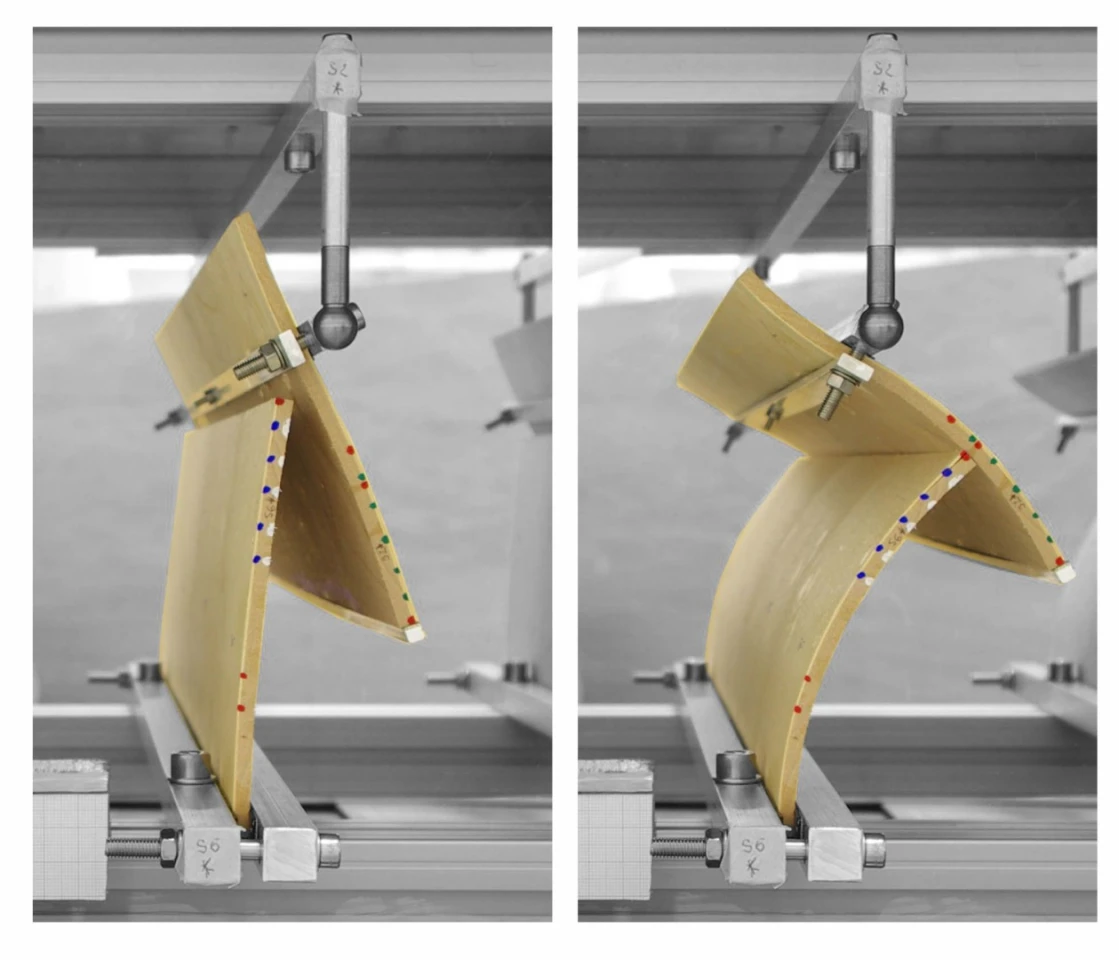 The system uses pairs of planks, where one is suspended about halfway up another. When it's humid, both planks stand relatively straight (left image), but when the air dries out the planks bend, so the lower one pushes the upper one out horizontally (right image), creating more shade underneath it