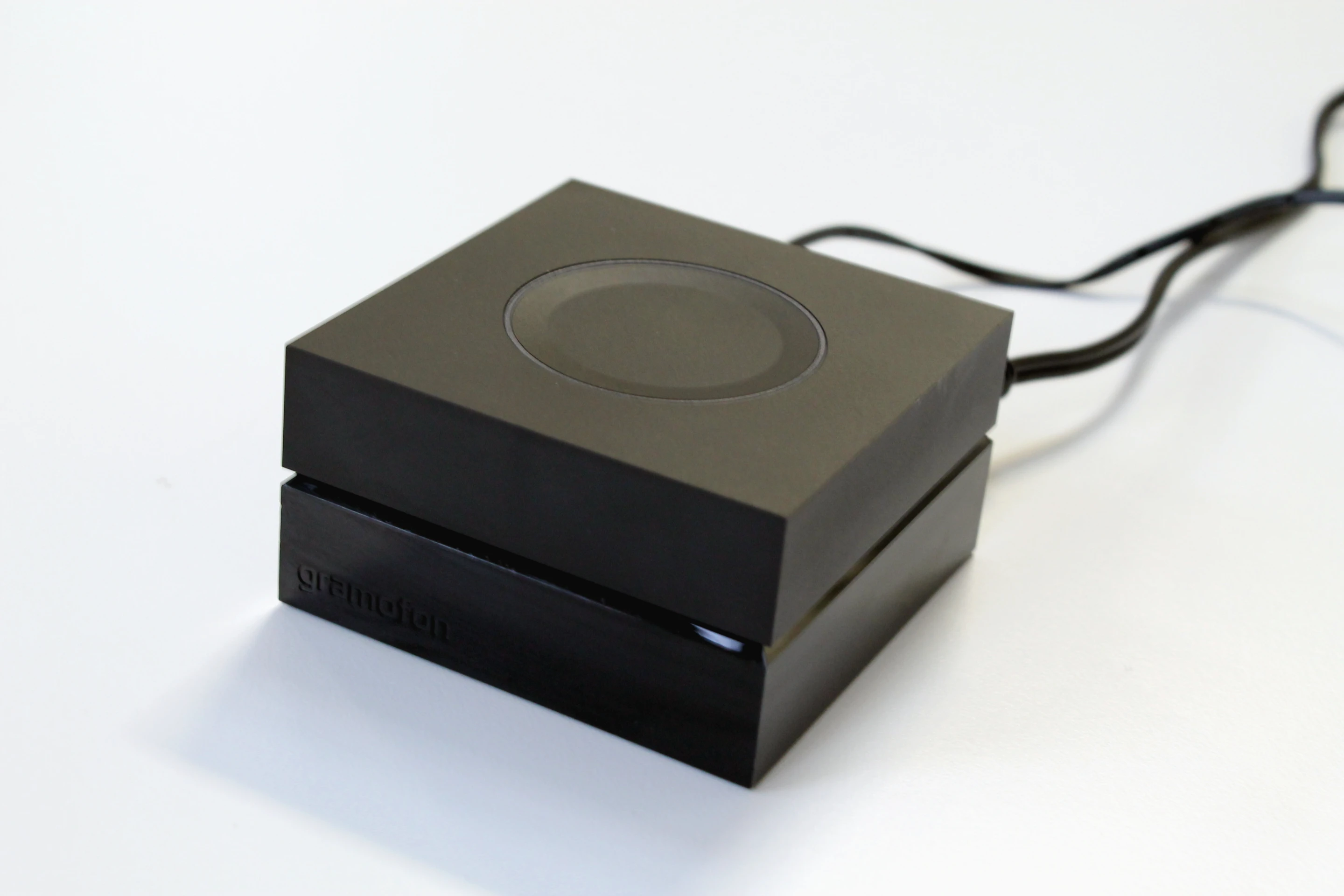 The button on the Gramofon can be used for resetting it and is surrounded by an LED border that glows different colors depending on the device's status (Photo: Stu Robarts/Gizmag)