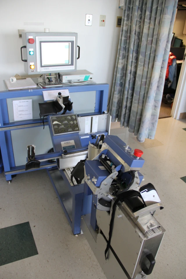 The AMES device robotically moves a paralyzed or partially-paralyzed limb, while vibrating the muscle receptors that would be involved in that movement if it was initiated by the patient