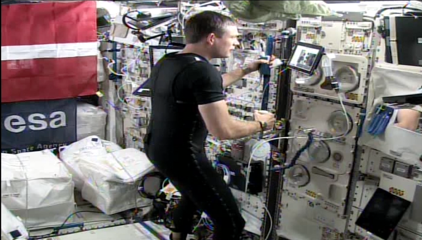 ESA astronaut Andreas Mogensen controlling the rover from a terminal aboard the International Space Station