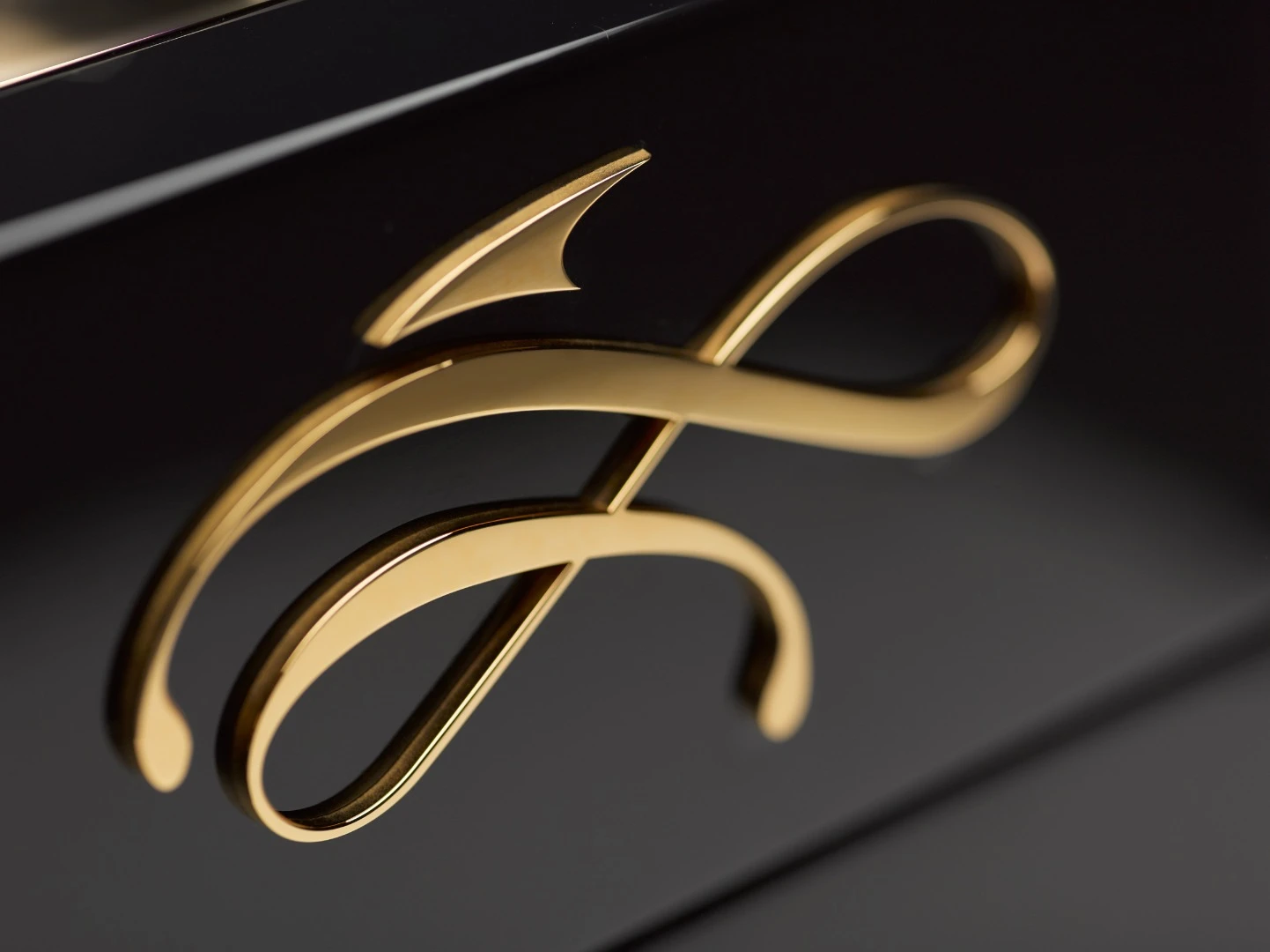The Emperador has a black lacquer finish