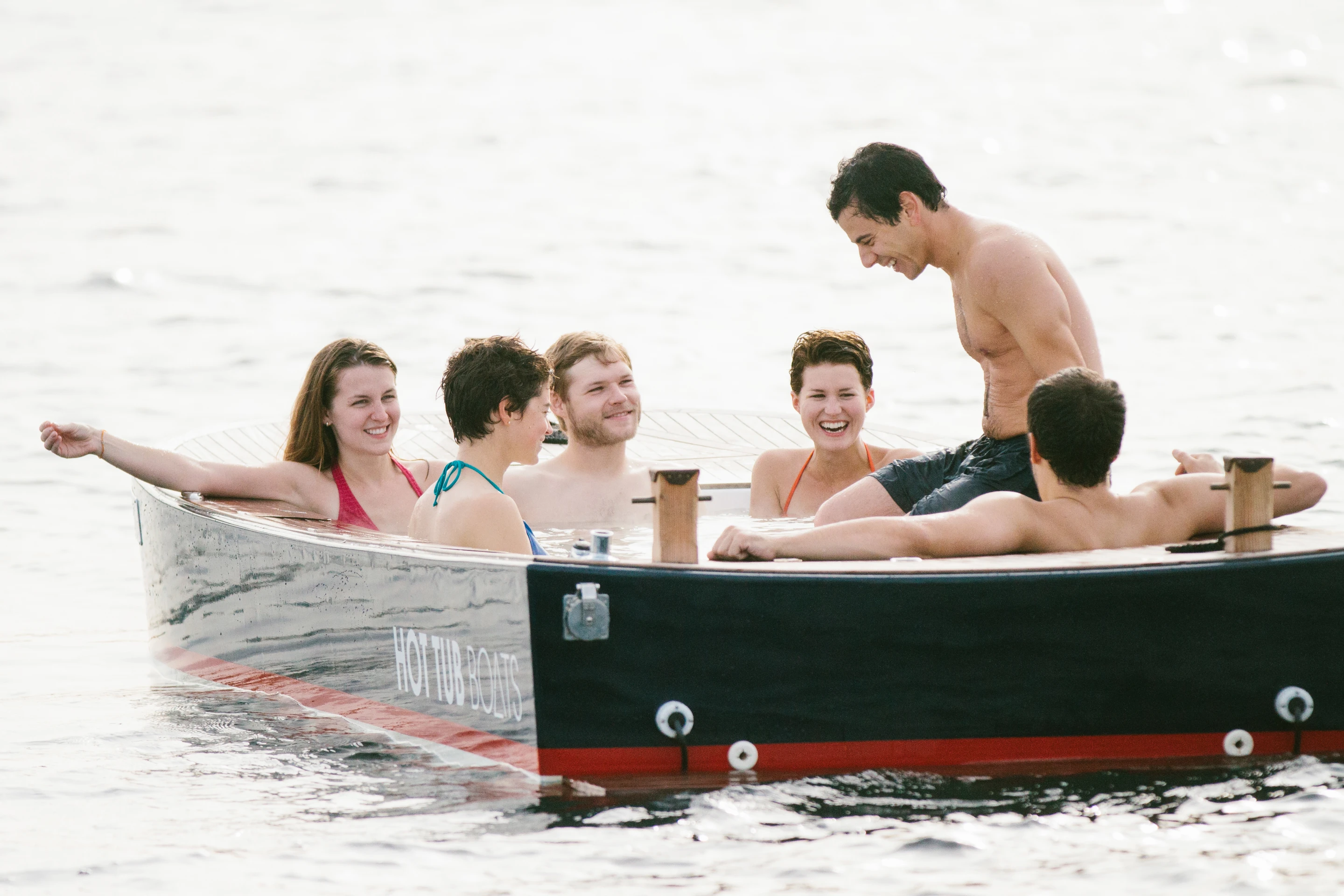 The Hot Tub Boat allows its passengers to soak while they cruise
