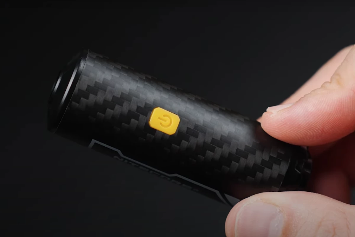 The Nitecore APCO5 is barely larger than the thumb gripping it
