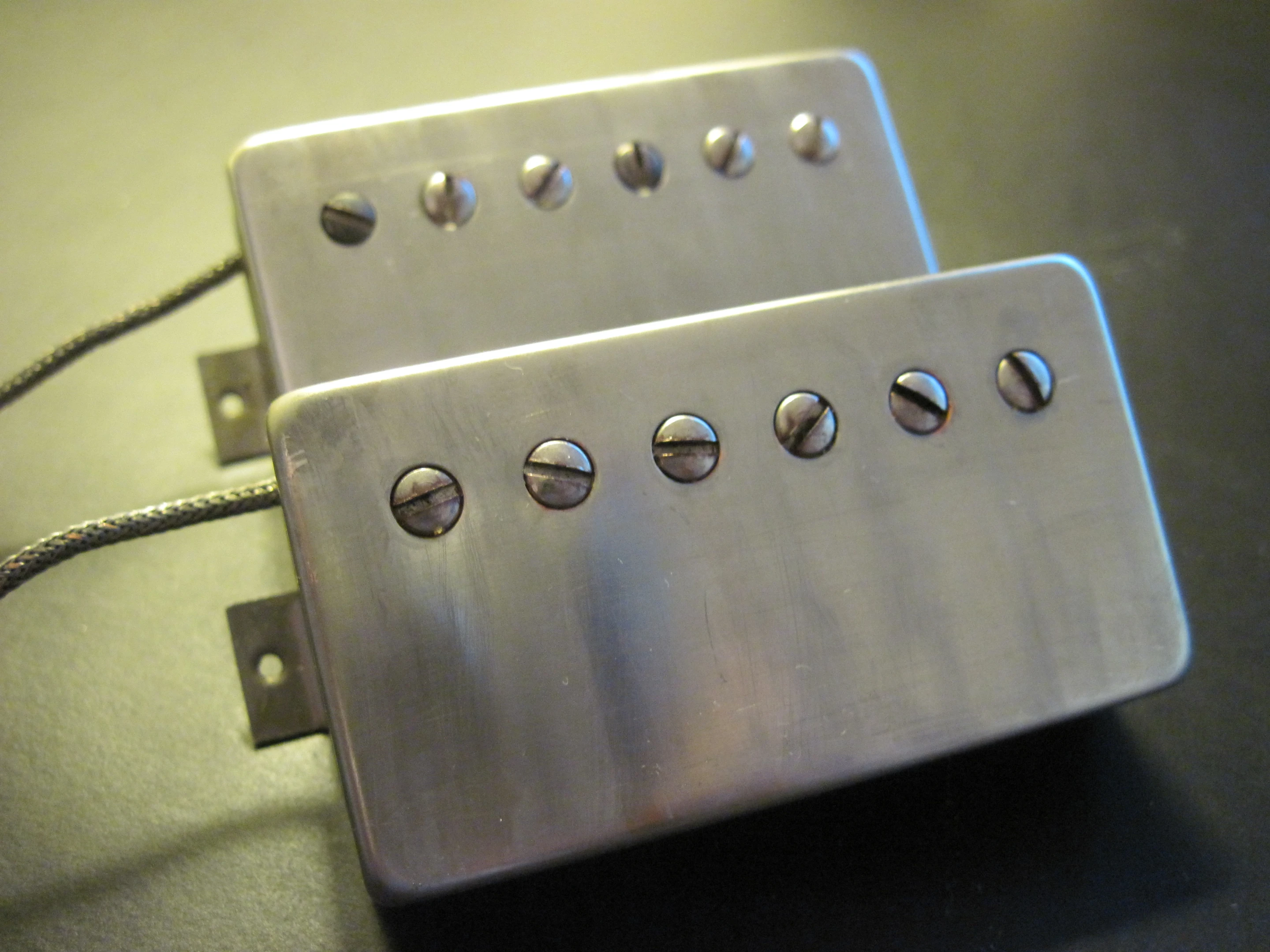 Ensuring era correctness and vintage detail, Doyle has used silver base plates, butyrate bobbins, maple spacers, alloy slugs and fillister pole screws, 42 gauge enamel wire and long cast magnets