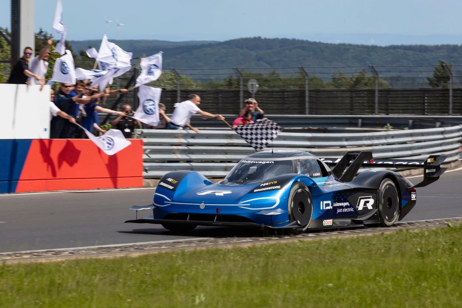 Volkswagen's ID.R crossed the line at Nürburgring-Nordschleife in 6:05.336 with an average speed of 206.96 km/h (128 mph), a new record for electric vehicles