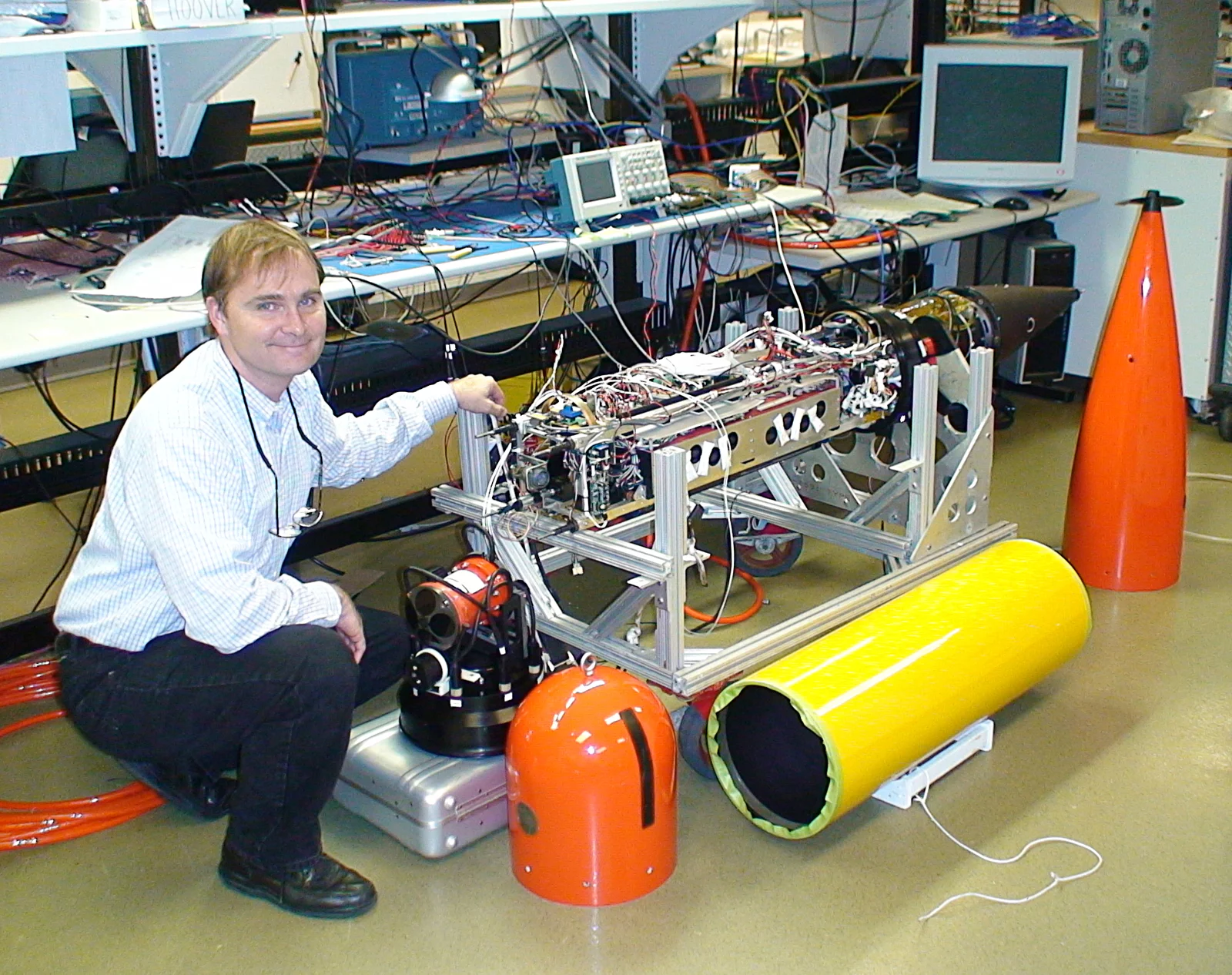 Jim Bellingham with Tethys long-range AUV (Image: Todd Walsh copyright 2010 MBARI)