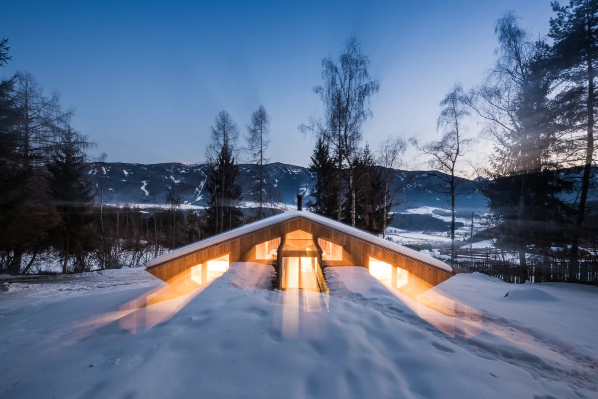 The vacation home, dubbed UFO, takes the form of a five-sided prism resting on six concrete pillars