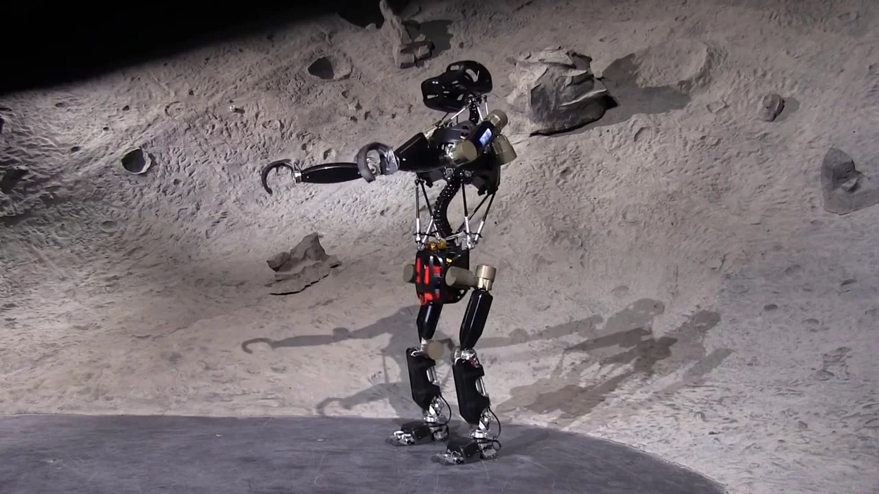 By standing upright, the robot can put its arms and hands to work