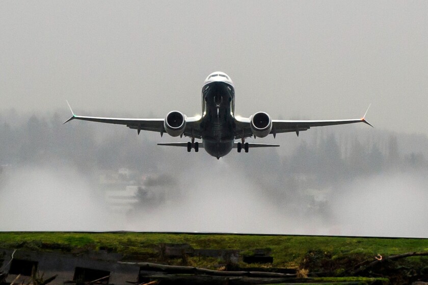 The 737 MAX flying over Lake Washington