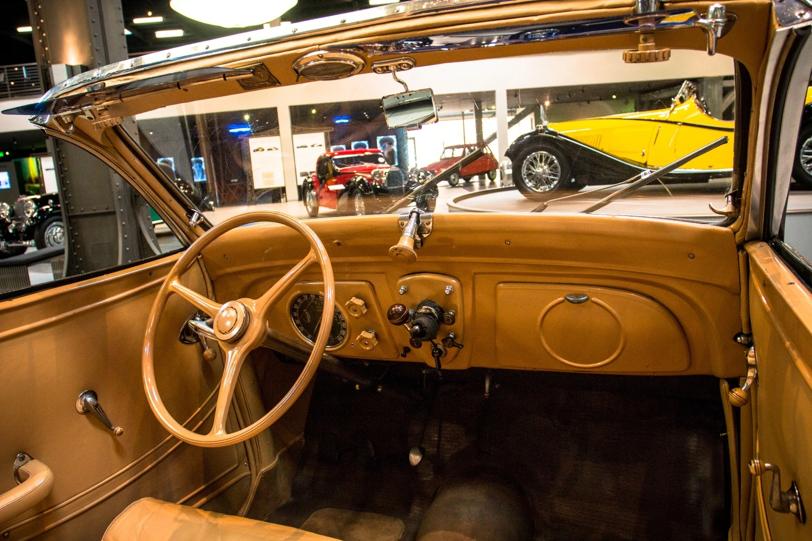 1937 Peugeot 402L Cabriolet Metallique Decouvrable: this early convertible's interior featured recessed "safety" door handles and a three-speed manual shift