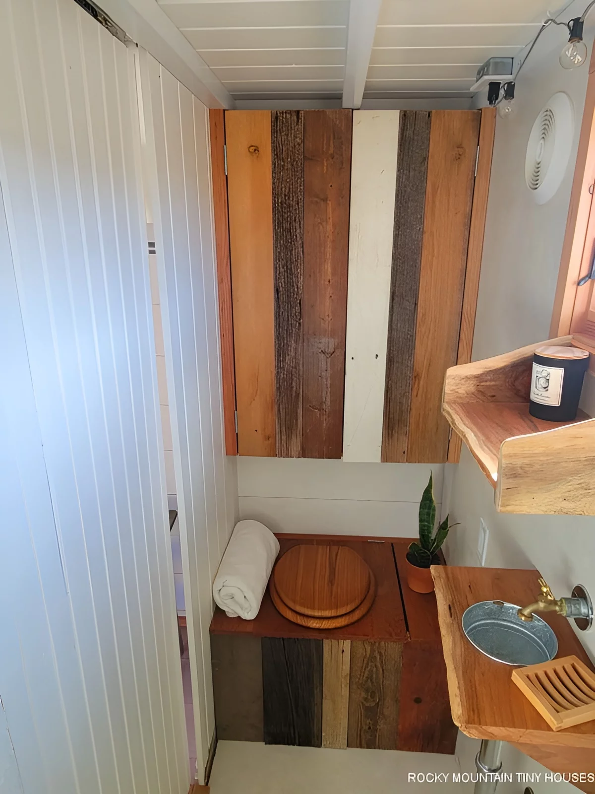 The Beatle's bathroom includes a shower, sink, and a composting toilet