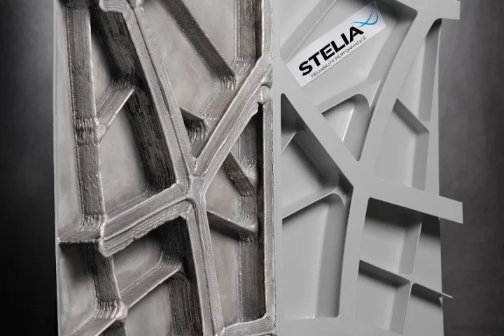 The printed fuselage panel showing the rough printed surface on the left and the polished and painted surface on the right