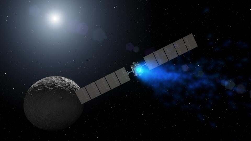 Artist's concept showing Dawn arriving at the dwarf planet Ceres