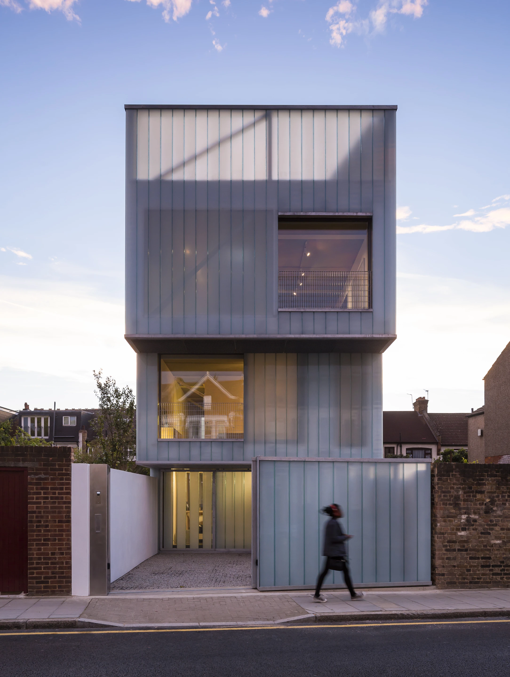 Slip House, by UK-based Carl Turner Architects, fits neatly between a row of terraced houses in Brixton, London