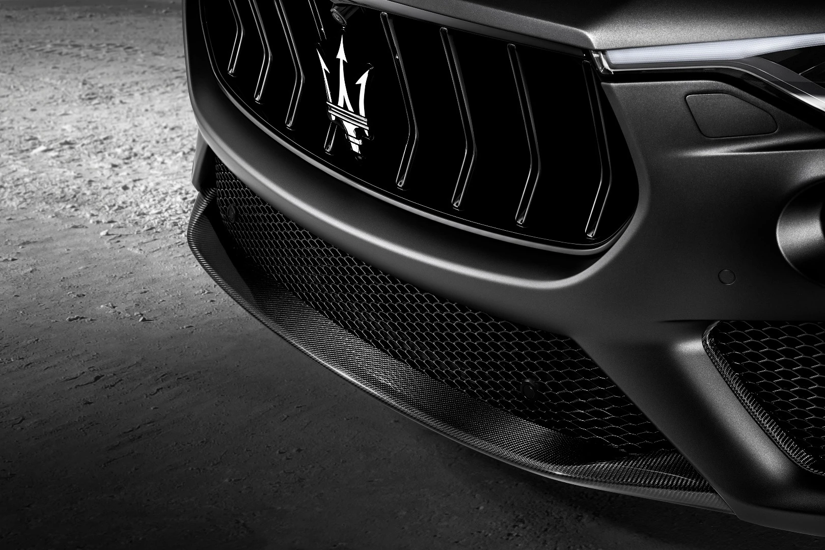 Exterior changes include a carbon fiber front splitter