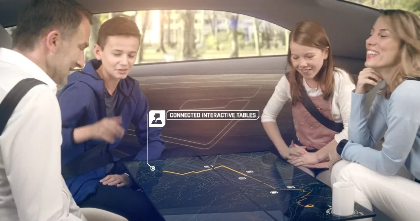 In Panasonic's Autonomous Cockpit Concept, each passenger can use a touchscreen individually or combine them all into a single display