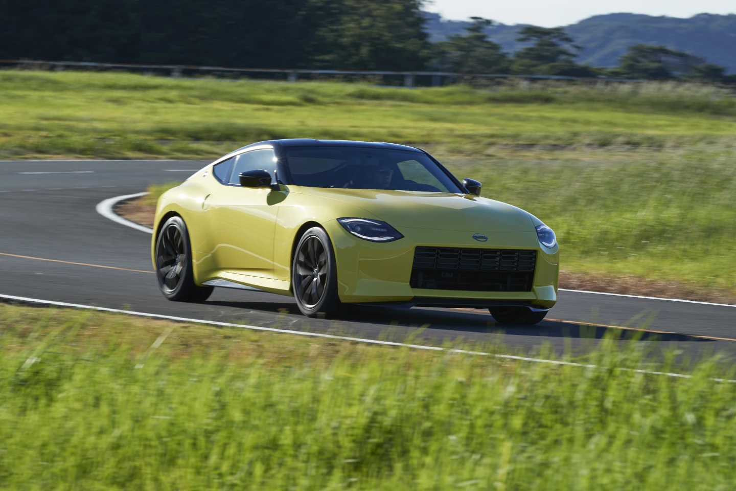 Nissan's still developing the powertrain, but it says the Z Proto is powered by a twin-turbo V6 and manual transmission
