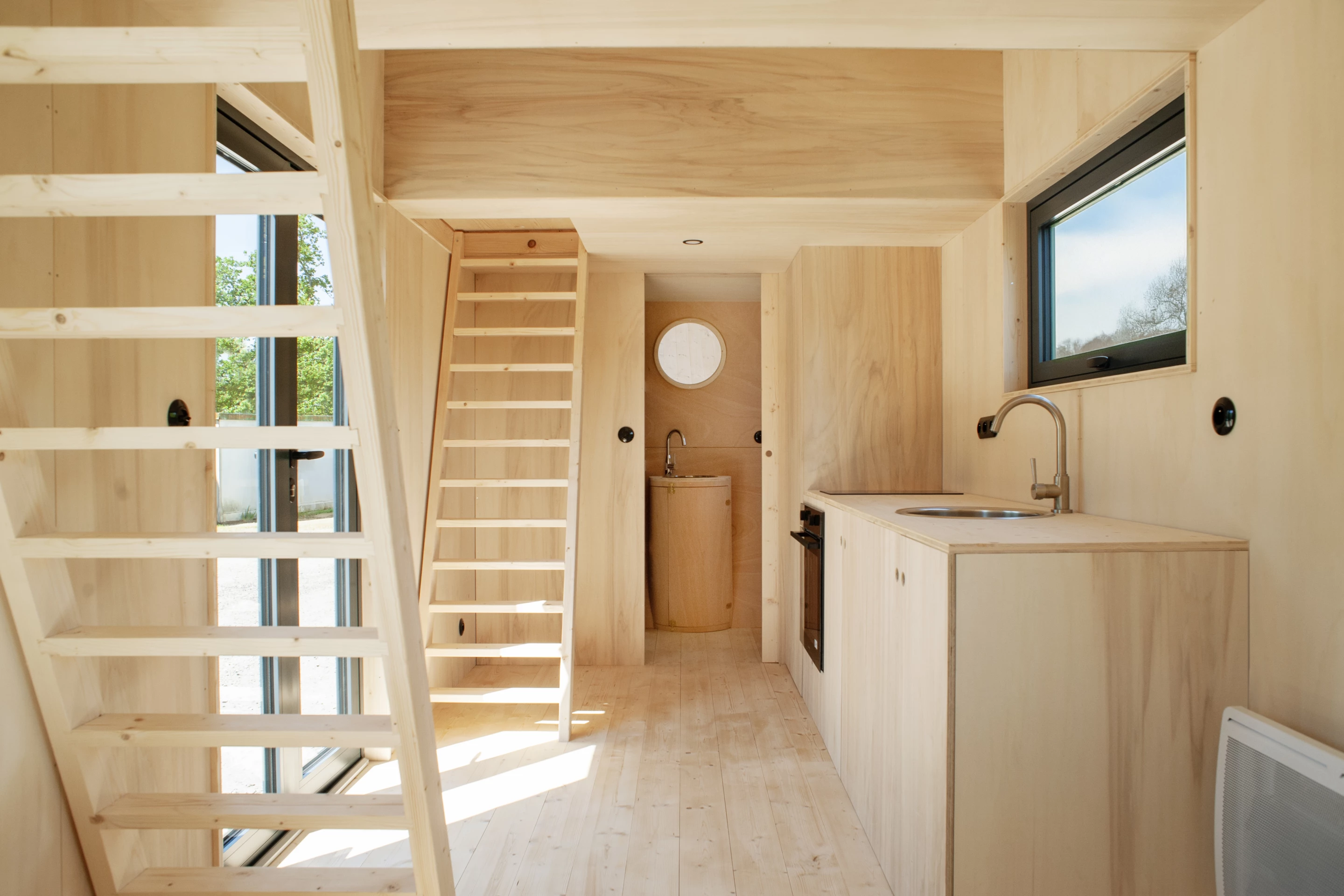 The Grand-Duc's glass doors open onto the home's kitchen
